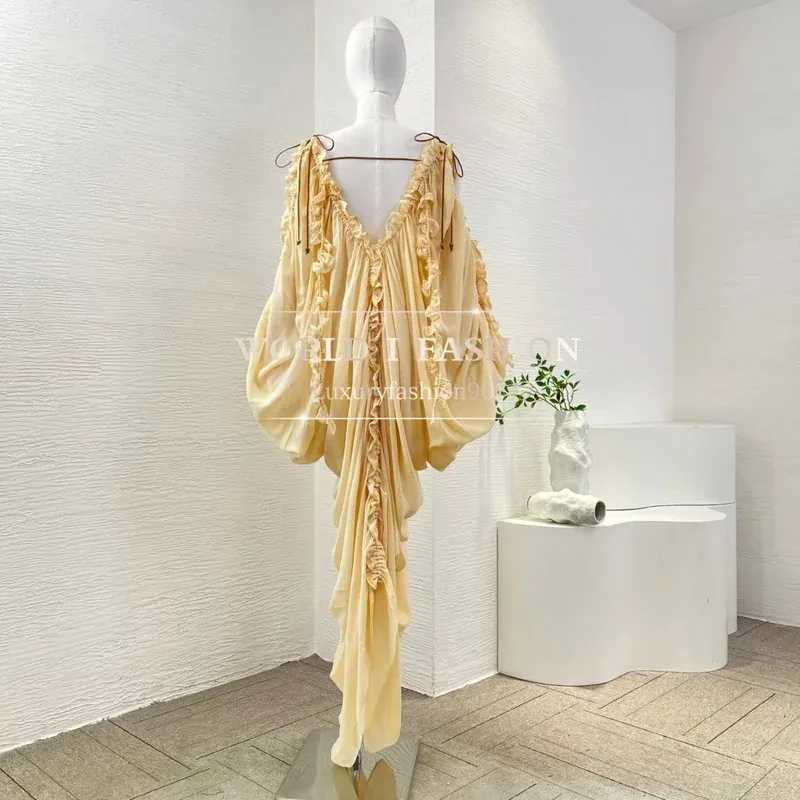 فستان نسائي عالي الجودة موديل 2025 أنيق أصفر مكشكش وأكمام طويلة غير متماثل