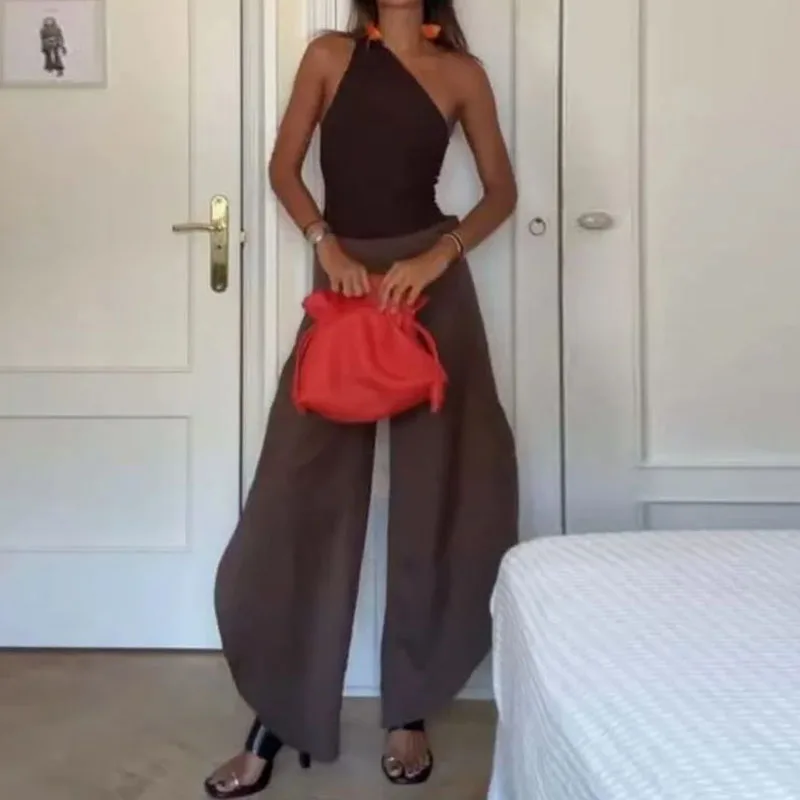 Casual cor sólida roupas de férias senhora sem mangas oco para fora magro duas peças design moda estilo slash colarinho topos & calças conjuntos