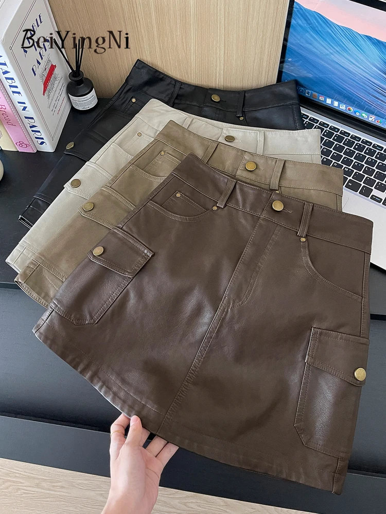 Beiyingni Amerikanischen Stil PU Leder Mini Rock Frauen Vintage Harajuku Hohe Taille A-line Cargo Röcke Damen Casual Straße Faldas
