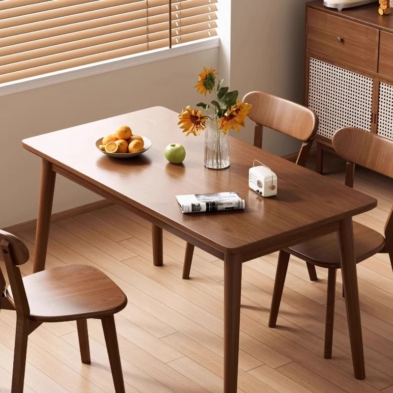 

Обеденный стол из цельного дерева. Маленький бытовой обеденный стол. Современный и простой китайский стиль. Прямоугольный обеденный стол из цельного дерева.