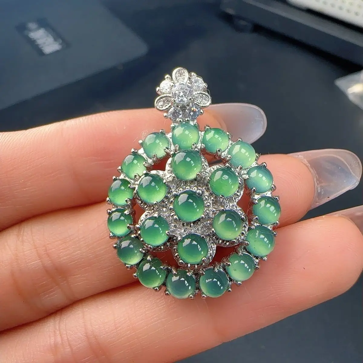 

Natural A jadeite ice blue egg surface pendant (choose one of the best in diversity)
