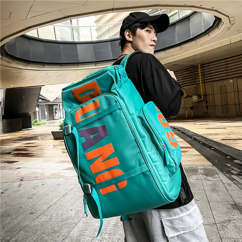 Schoolbag cool large capacity backpack mountaineering travel backpack skateboard veneer men's bag dry wet separation fitness bag