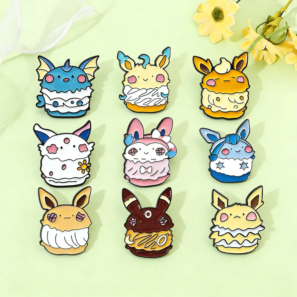 Neue Pokemon Pikachu Eevee Emaille-Pins Niedliche Anime-Fuchs-Monster-Elfen-Charaktere im Kuchen-Stil Brosche Abzeichen Schmuck Geschenk für Mädchen