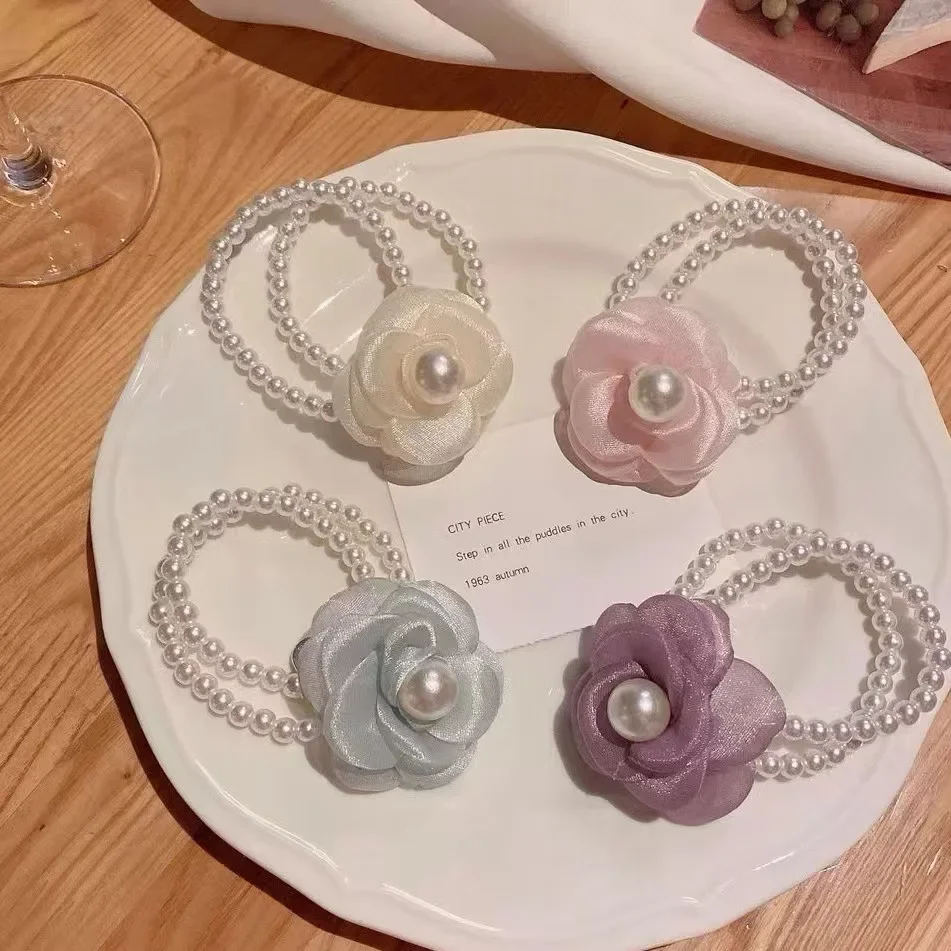 

New Camellia Pearl Hair Rope Bracelet Dual-purpose Princess Ball Head High Ponytail Fashion Hair Band Hair Accessories