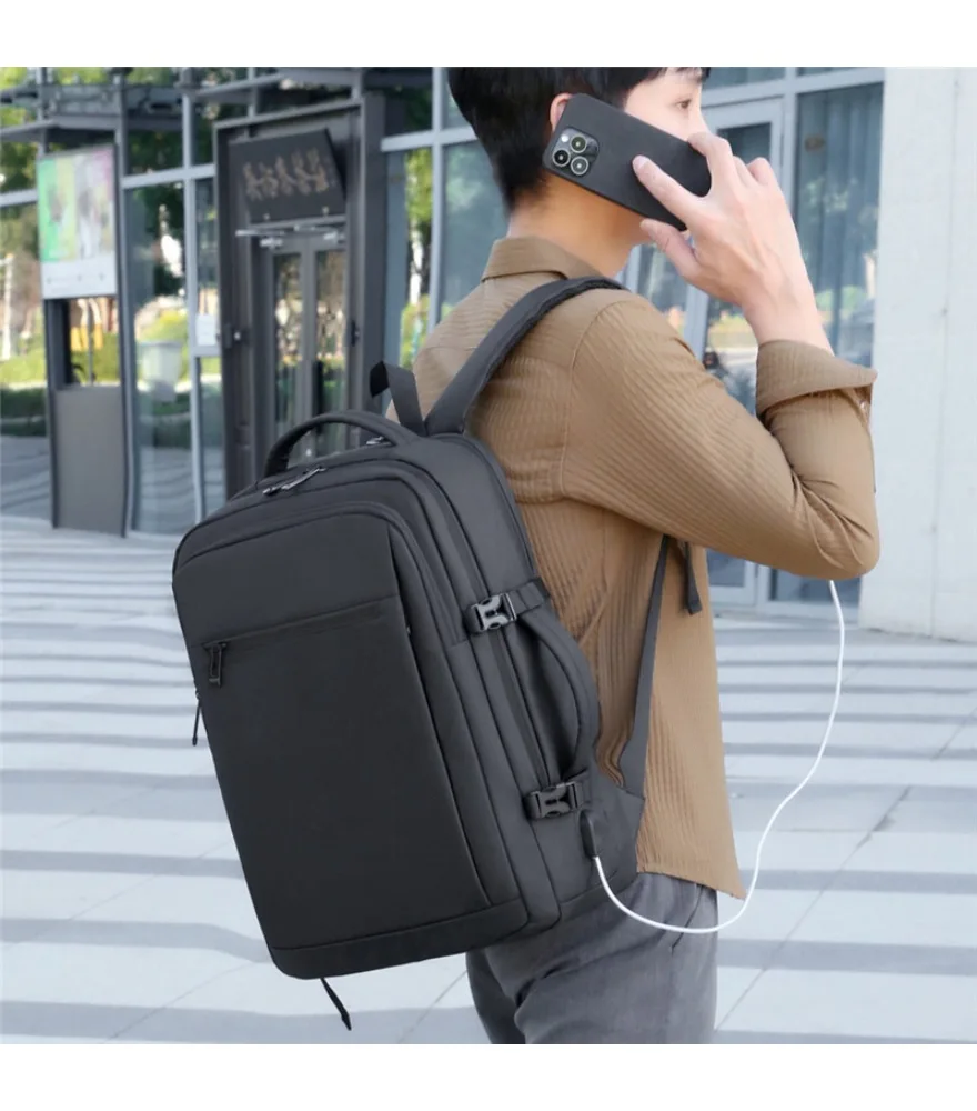 Black expandable laptop backpack with adjustable side buckles anti splash extra side hand strap and built in USB port for men