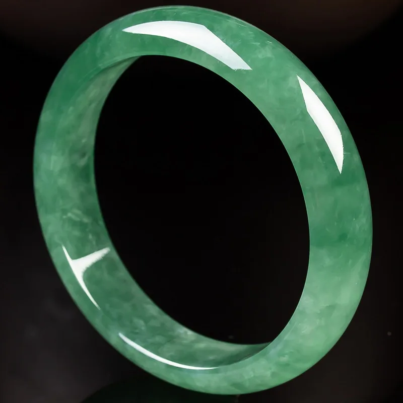 Myanmar ice bracelet, bright green, full of grains, moist and translucent with floral patterns, treated jadeite