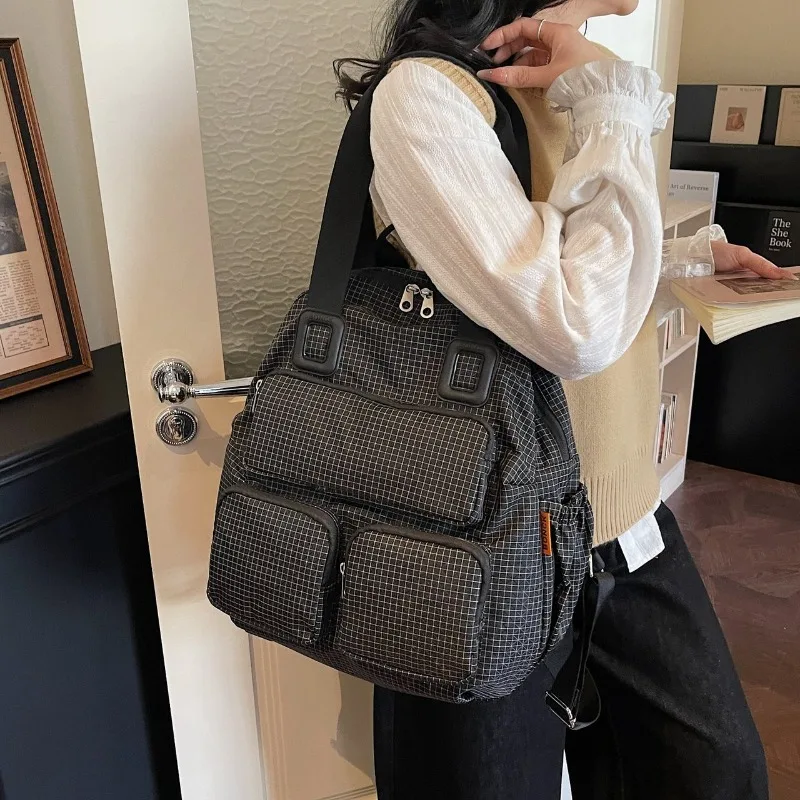 

Hot Sale Nylon Youth Casual Travel Backpack Multi-pocket Checkered Backpack for Women Large Capacity Convertible Shoulder Bag