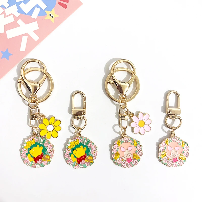 Disney Pooh Bear Piglet Tigger flor corona diseño dibujos animados llavero de Metal bolsa de maquillaje cremallera decoración colgante regalo de cumpleaños
