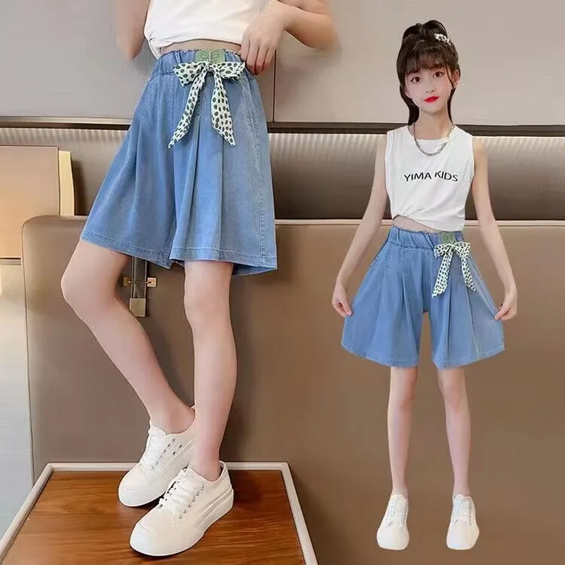 

Джинсовые шорты Tencel для девочек 2025 г., новые летние детские короткие штаны 2025 года, свободные и тонкие зарубежные брюки с высокой талией и бантом