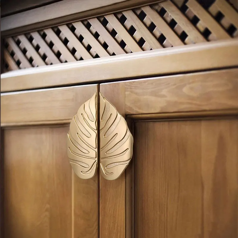

Креативные ручки в виде листьев для шкафа и ящика, домашний декор, ручки для шкафа для спальни, современная простая мебельная фурнитура 64 мм, пара