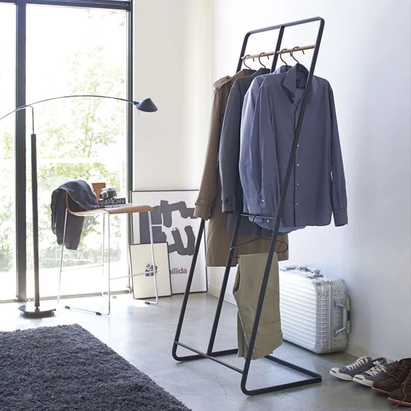 

Nordic Iron Clothing Rack for Home & Commercial Use, Garment Display Stand, Bedroom Clothes Hanger, Space-Saving Solution