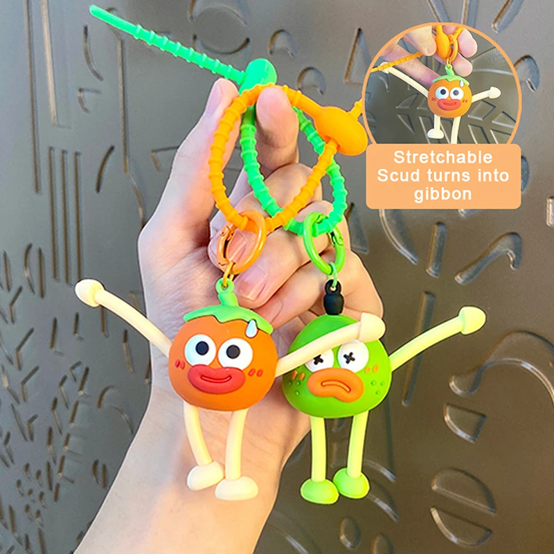 

Anime Doll Cartoon Stretching Hands And Feet Ugly Fruit Doll Keychain Pendant Creative Decompression Pull Cute Children’s Gift