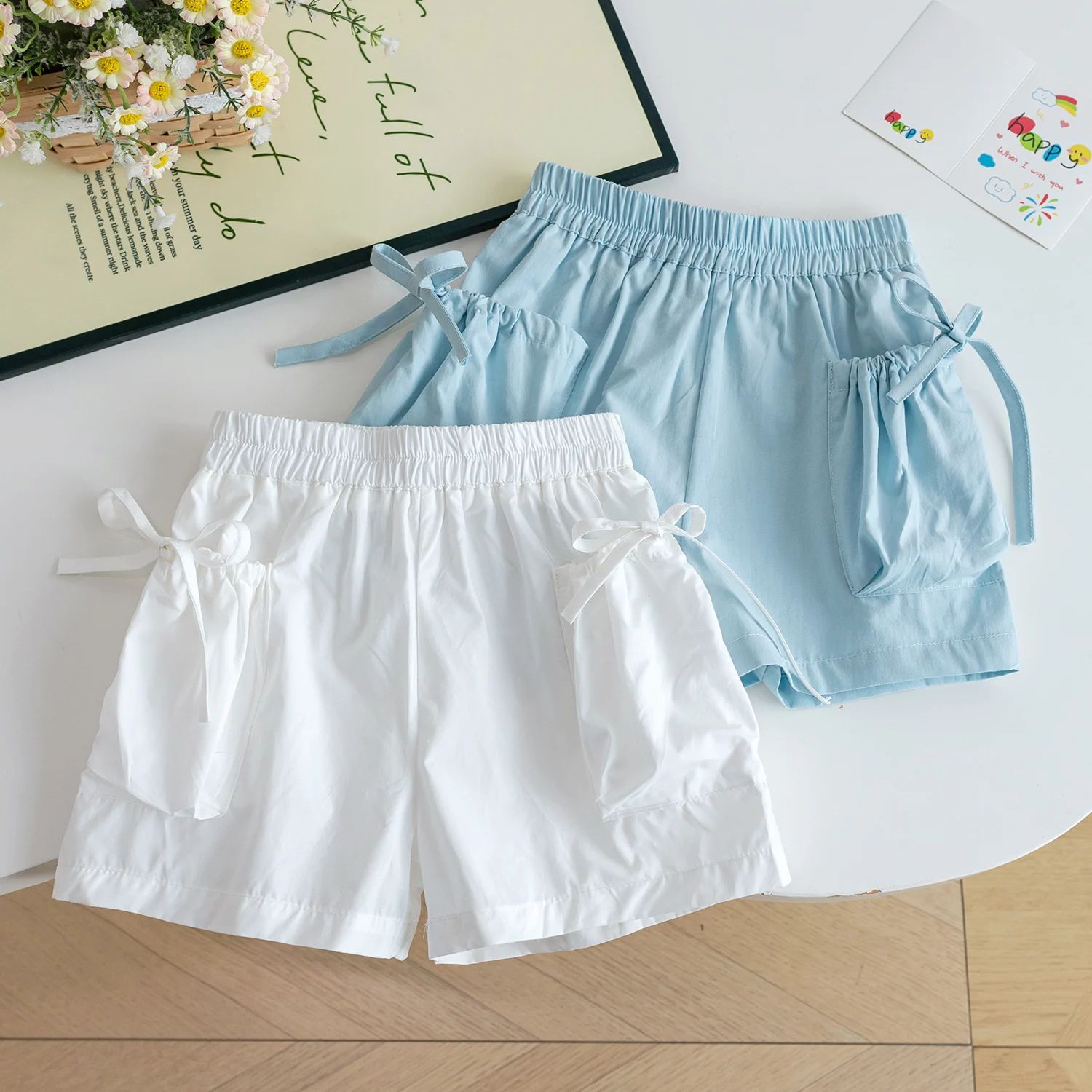 طفل الفتيات السراويل غير رسمية الحلو عقدة شعر للفتيات جيب كبير فضفاض رقيقة السراويل القصيرة الصيف الأطفال عارضة الركبة طول السراويل