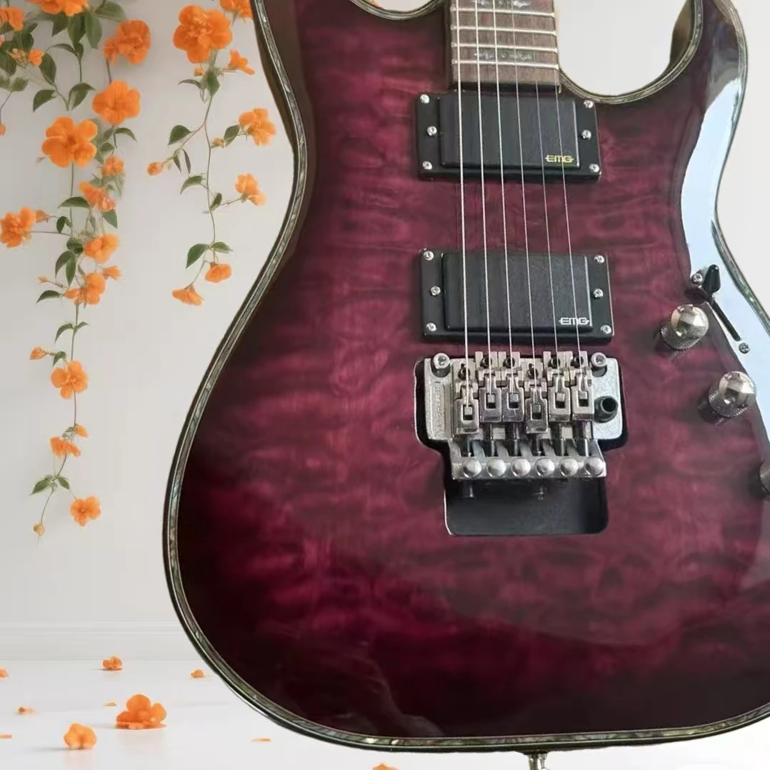 

Best-selling 6-string purple electric guitar, with black pickups and water ripple effect