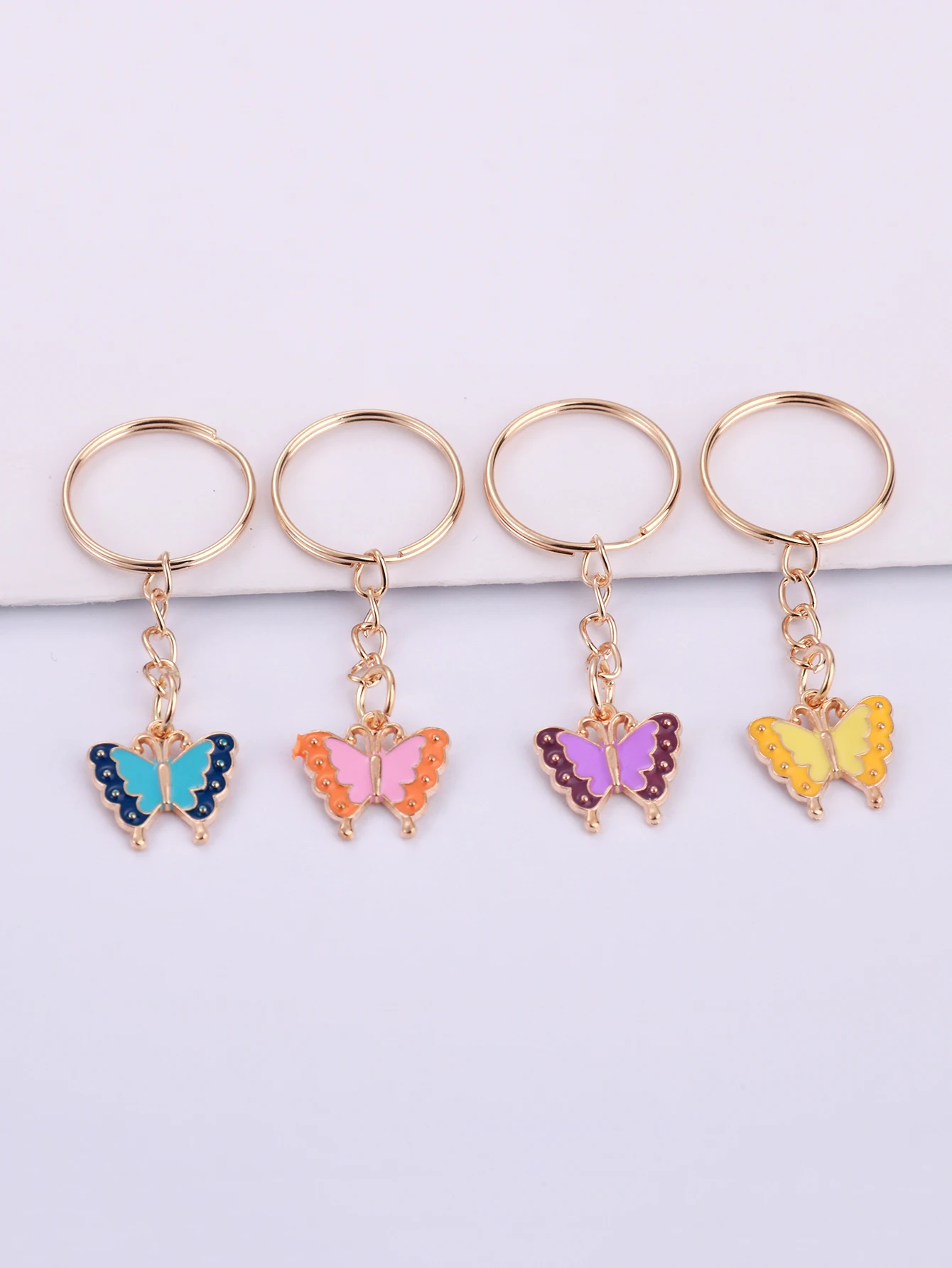 Porte-clés en métal papillon en alliage mignon, porte-clés étoile, décoration de portefeuille, sac à dos, pendentif breloques, cadeau de fête d'anniversaire, 8 pièces