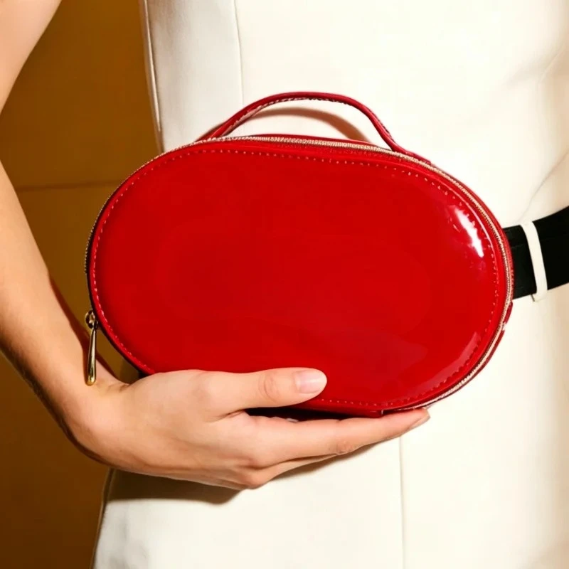 bag-luxury-glossy-bright-red-oval-handheld-makeup-organizer-pouch-embossed-logo-waterproof-travel