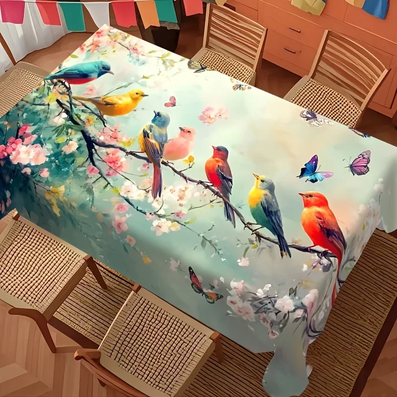One tablecloth featuring colorful birds and cherry blossoms, with several colorful birds perched on the pink cherry branches.xzj