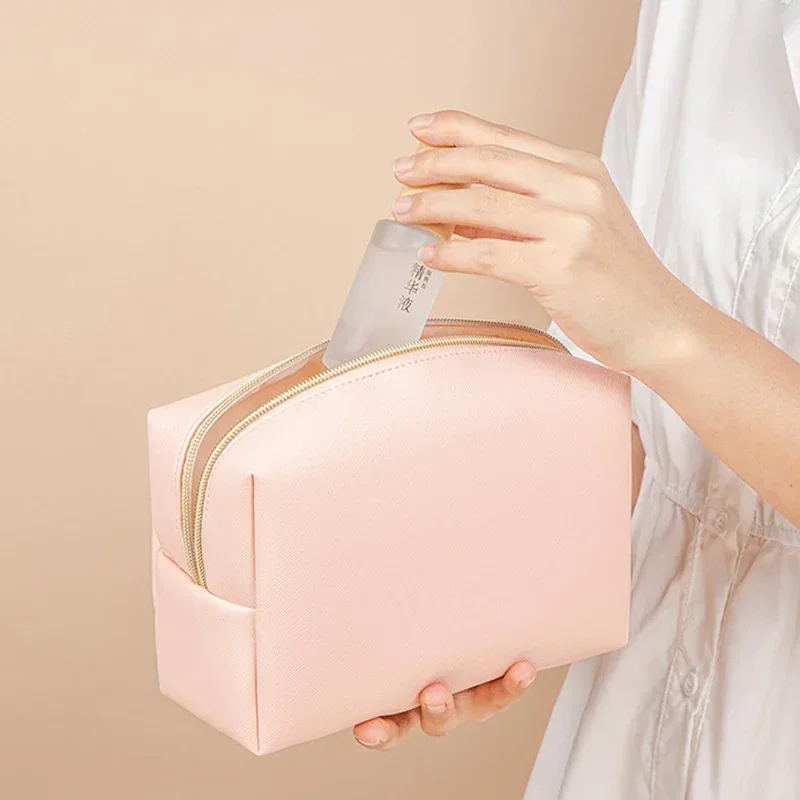 Bolsa de maquillaje impermeable para mujer, neceser de cuero PU, Color sólido, portátil, para viaje, almacenamiento de artículos de tocador, organizador, 2023