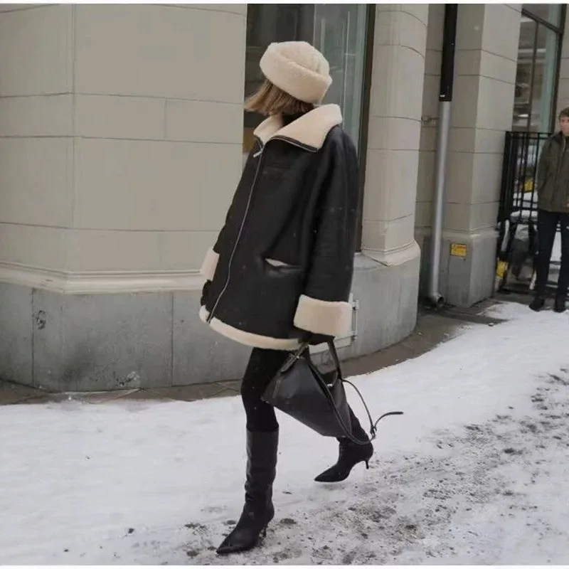 The New Large-sized Fashionable Lambskin Coat for Women's Autumn and Winter Is A Loose and All-in-one Coat with Elegant Charm.