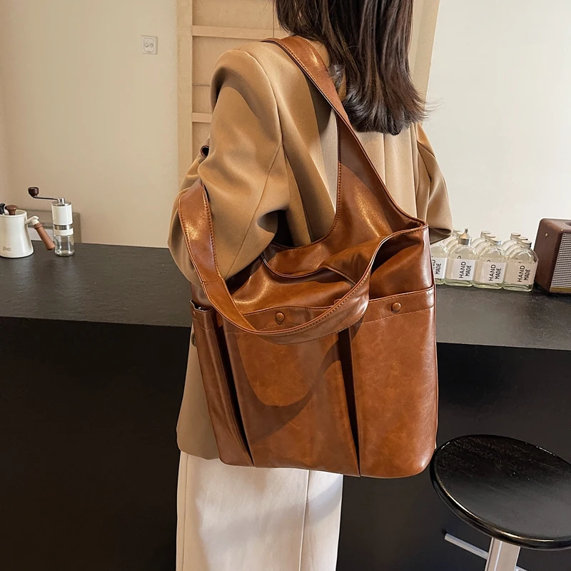 

Bucket Purse for Women Large Capacity Underarm Bag PU Leather With Pockets Hobo Bag Solid Color Handbag Travel Shopping Bag
