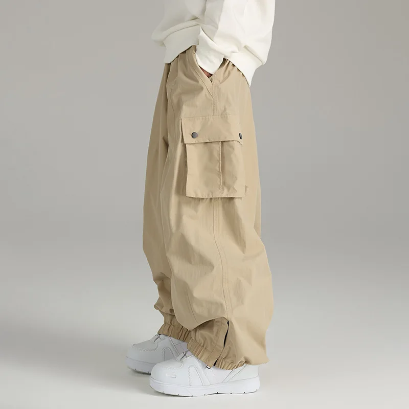 Xueyi Pai سراويل تزلج فضفاضة مقاومة للماء والرياح على الجليد، بدلات تزلج للرجال والنساء للدفء الخارجي في الشتاء #1