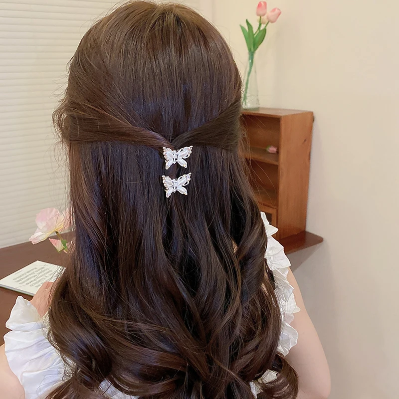 女の子と女性のための蝶のヘアクリップ,ラインストーンがちりばめられたファッションのヘアクリップ,豪華なデザインのヘアアクセサリー2023