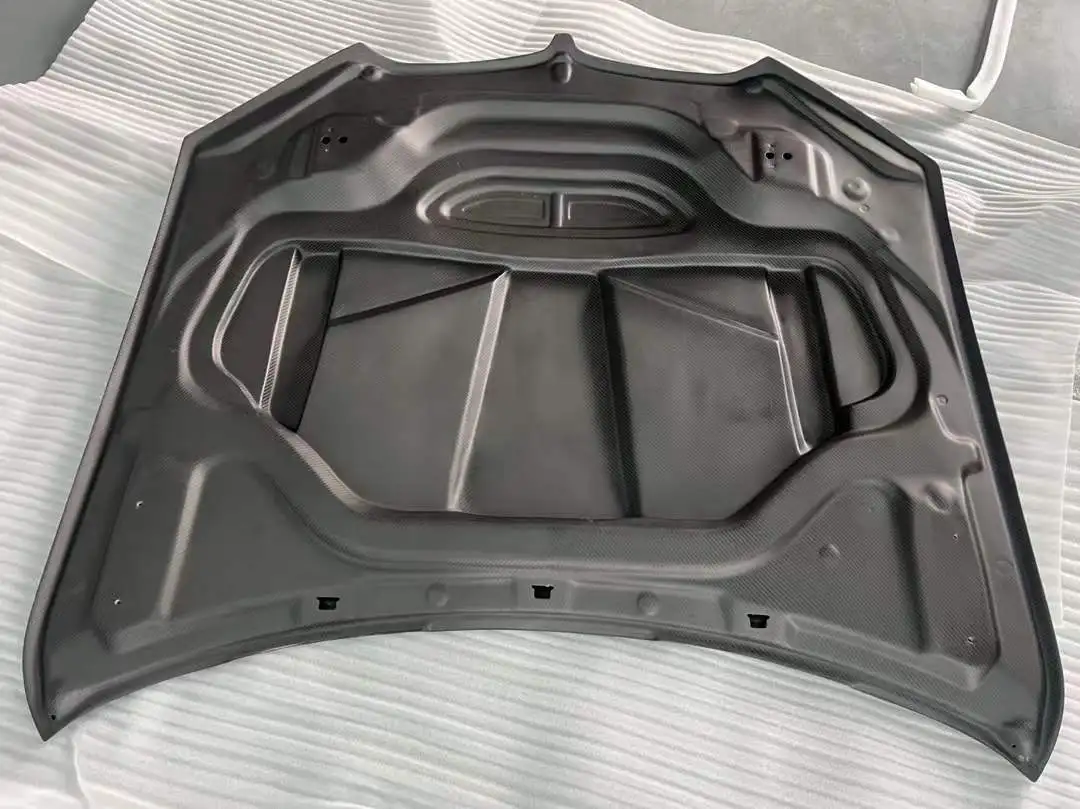 

Капот из 100% сухого углеродного волокна, изготовленный на заказ, с указанием срока поставки. Капот версии LD, подходящий для BMW X5 G05, X6 G06, X5M, X6M.