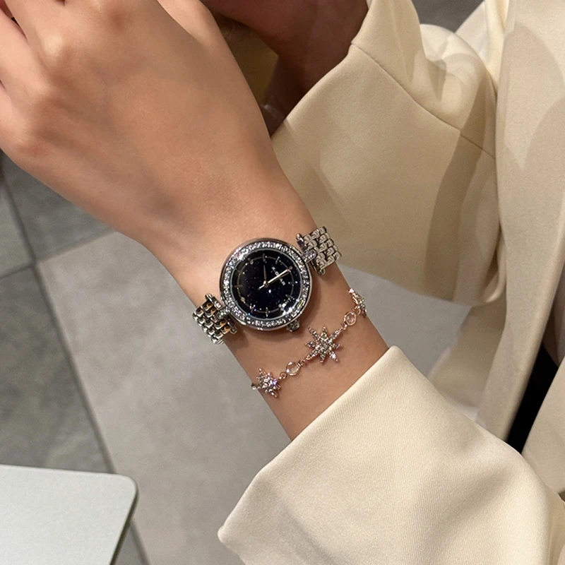 ساعة كوارتز نسائية أنيقة بمينا مرصعة بالنجوم من X-GEAR - ساعة عصرية بسوار من الفولاذ المقاوم للصدأ هدية للمهرجانات