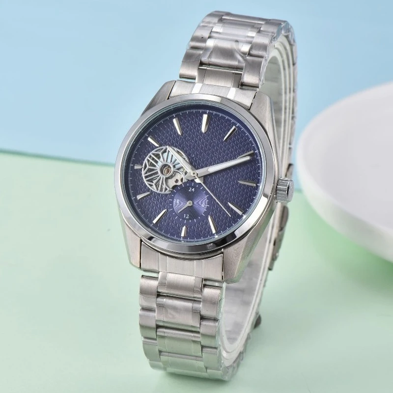 2025 ساعة ميكانيكية أوتوماتيكية فاخرة للرجال سوار فولاذي غير قابل للصدأ كريستال الياقوت مقاوم للماء 100 متر مضيئة الهيكل العظمي الهاتفي