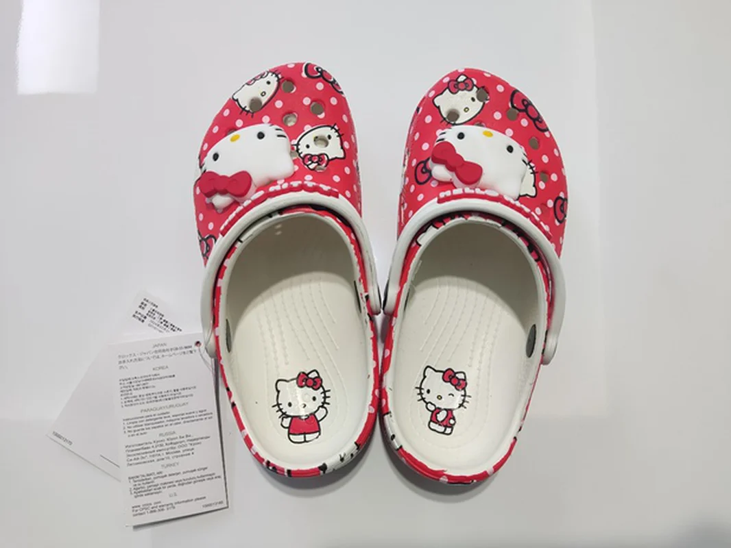 MINISO Hello Kitty Pochacco Melody verano niños dibujos animados niños zapatilla antideslizante suela blanda Wrap Toe sandalia regalo de vacaciones ﻿