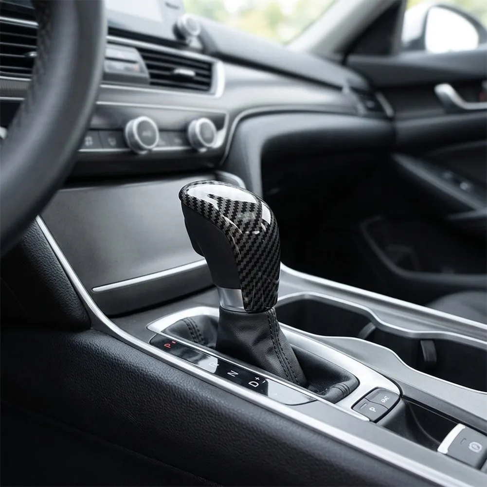 Elevate your For Nissan For Sentra\'s interior design with this premium Carbon Fiber Look Trim for the gear shift knob