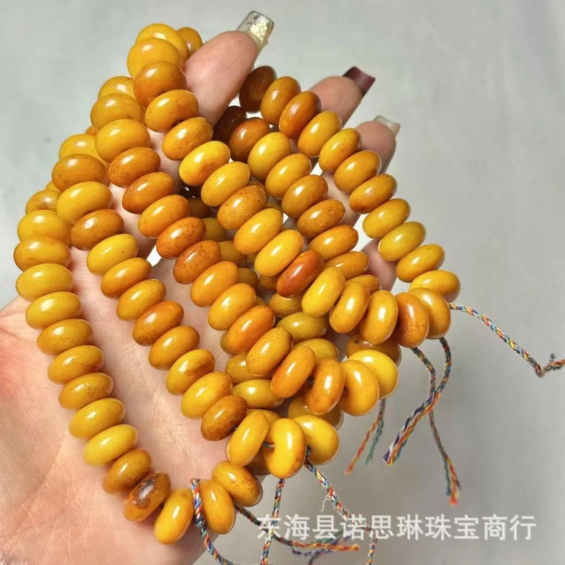 

Tibetan Backflow Bone UFO Beads Yellow Gracked Glaze Bracelet