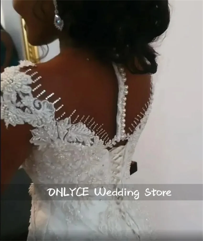 Abiti da sposa di lusso con o-collo Perle di perline Eleganti applicazioni in raso Abito da sposa Lunghezza pavimento Abiti da sposa Personalizzati