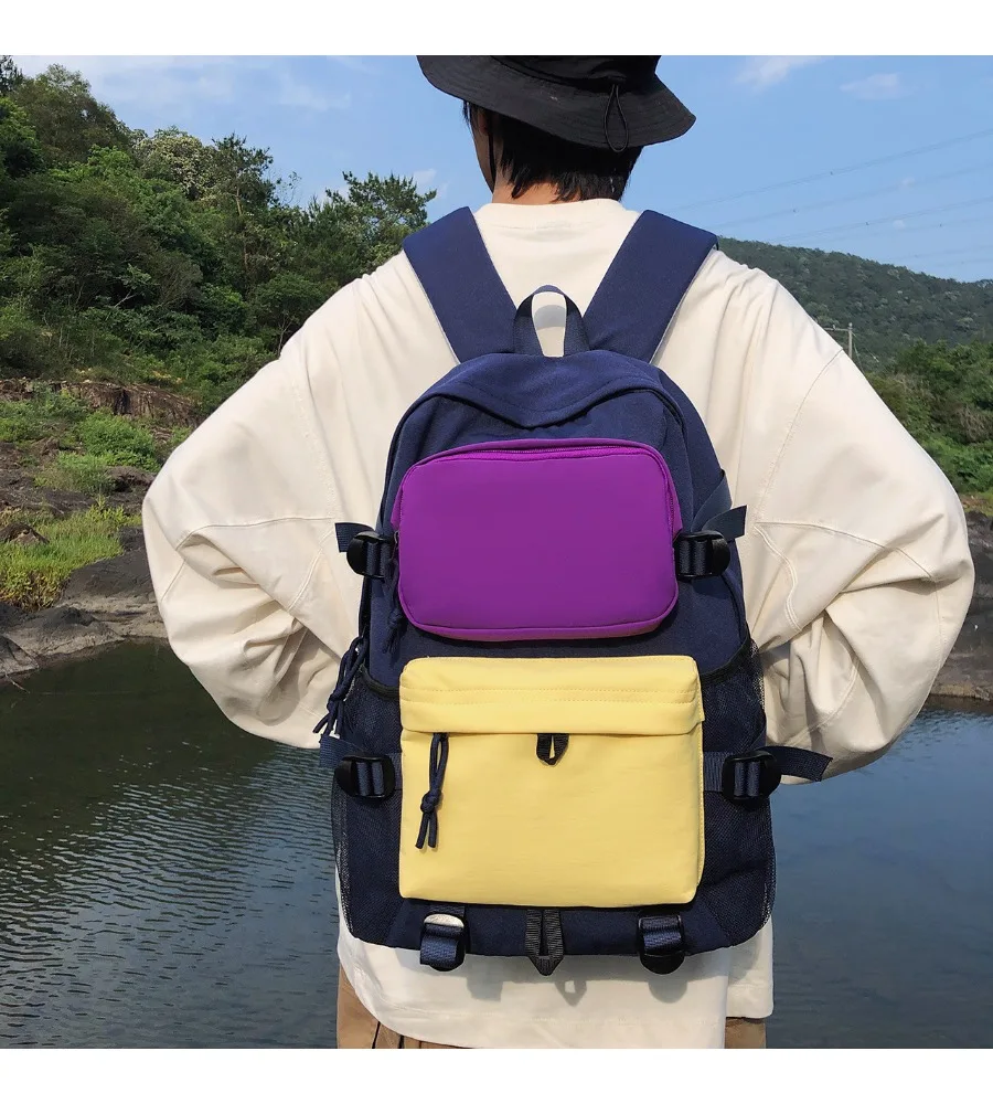 Junior high school students schoolbags for men and women are casual trendy and cool large-capacity backpacks contrasting