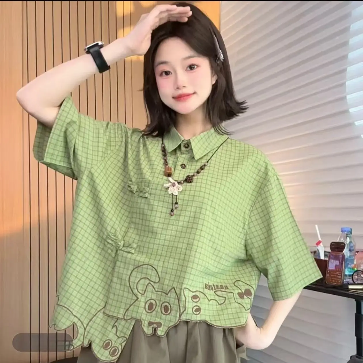 

2026 Summer Original Embroidered Cat Green Plaid Thin Short Sleeve Top, Irregular Placket Loose Blouse