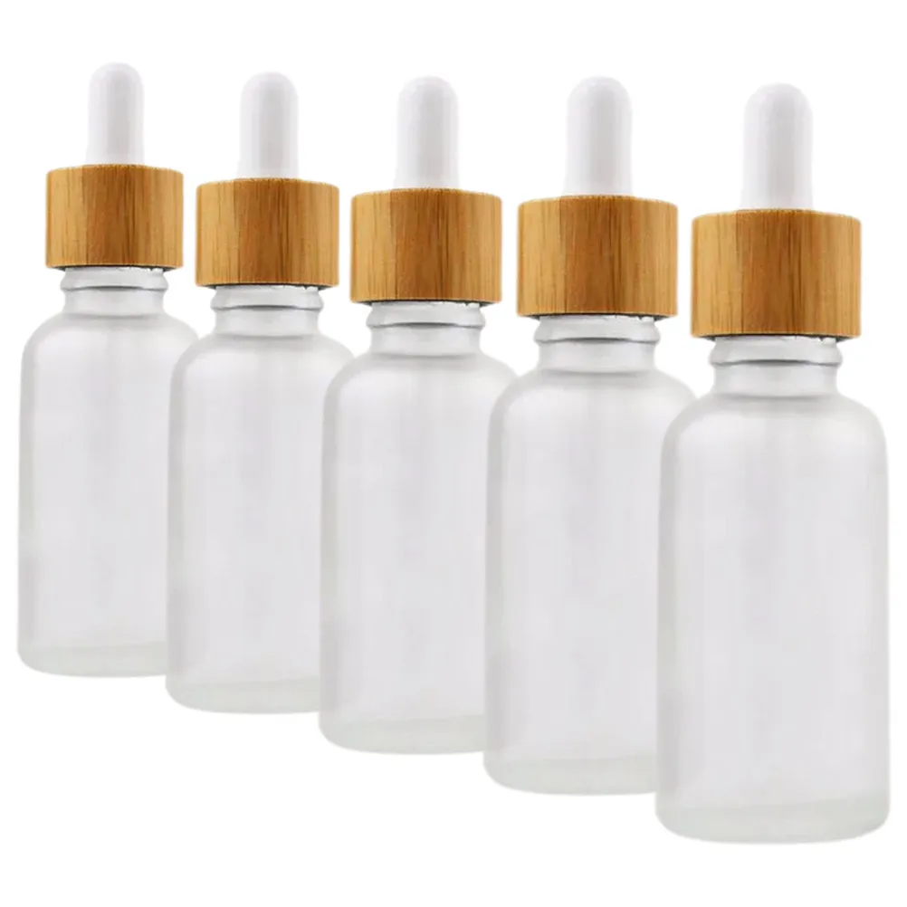

5Pcs 30Ml Glass Essential Oil Bottles with Dropper Bamboo Wood Ring Cap Reusable Leakproof Mini Dropper Bottles for Travel
