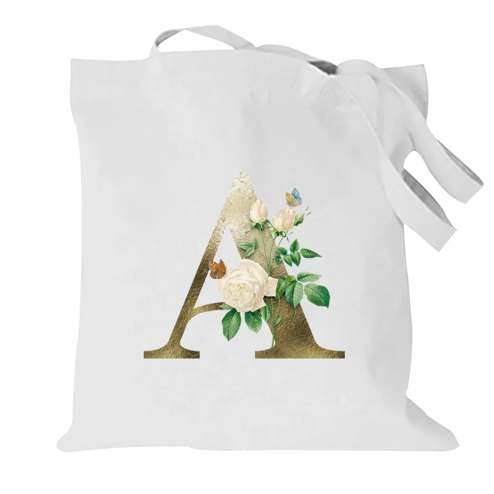 Sac fourre-tout en toile de grande capacité pour femme, sac à main à motif de fleurs dorées et de lettres, sac à provisions pour les déplacements