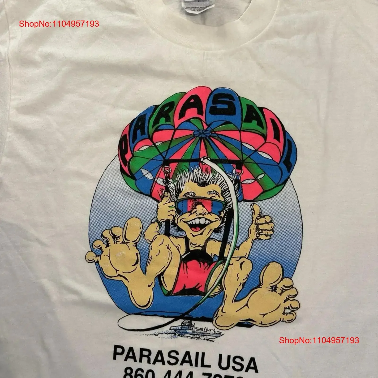 Vintage 90s Parasail EE. UU. Caricatura de dibujos animados Camiseta Mediana vintage Lavado Estirado streetwear ropa de diseñador de moda