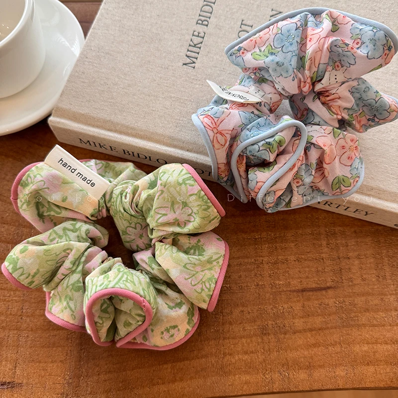 Korean Floral Scrunchie for Women - Chic and Playful Design, Adds a Luxurious Touch to Your Look.