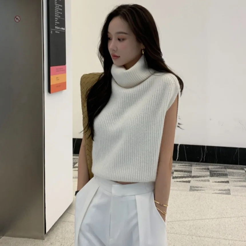 เสื้อไหมพรมคอสูงทรงเข้ารูปสำหรับผู้หญิง สไตล์เรียบง่าย ดูผอมเพรียว เหมาะสำหรับฤดูใบไม้ร่วง ไม่มีแขน ช่วงเอวเข้ารูป