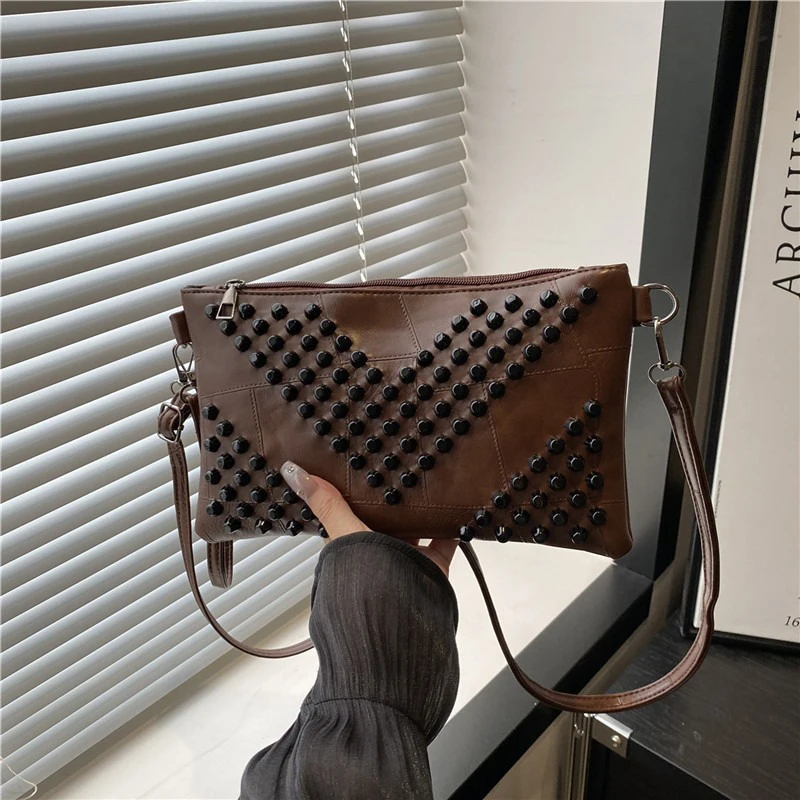 2025 New Trendy and Popular Personalized Rivet Shoulder Bag - Elegant and Casual Retro European Fashion Crossbody Bag