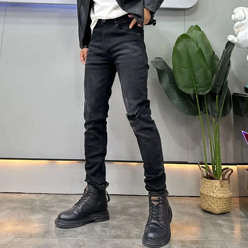 カウボーイデニムブラックフェイクリップドジーンズメンズトレンドブランド秋冬2025新作ファッショナブルな伸縮性スリムスキニージーンズパンツ男性用