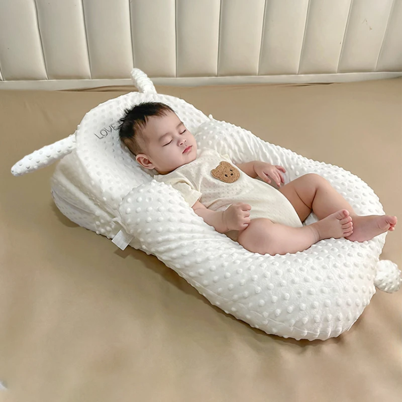 Baby anti-spitting slope pad and choking pillow newborn baby lies on the nursing artifact to appease the side pillow.