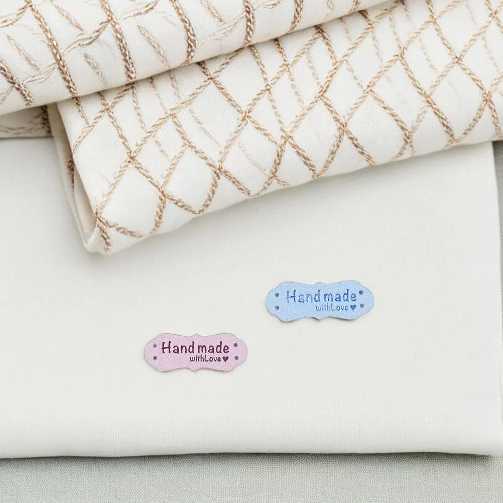 

100Pcs Handmade Crochet Embossed Labels Soft Sew on Tags for Garments Hats DIY Clothing Accessories Fashion Designers Craft