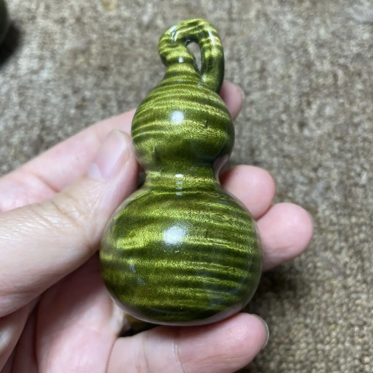 Golden Nanmu Wood Gourd Hand Piece Natural Water‑Ripple Grain Hand‑Carved Sculpture Collectible Desktop Christmas Gift Ornament