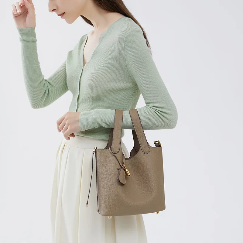 Spring new niche high-end bags 2024 new bags women\'s bucket bags handheld cabbage basket trend