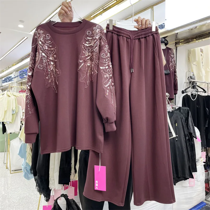 

Комплект SuperAen в европейском и американском стиле: топы с длинными рукавами, вышивкой пайетками и цветочным узором, а также широкие брюки с эластичным поясом.