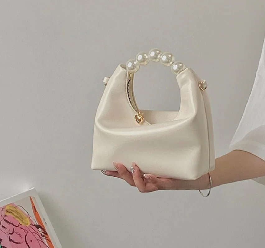 Bolso de mano pequeño con asa de perla para mujer, bandolera de hombro con cadena a la moda, Color sólido