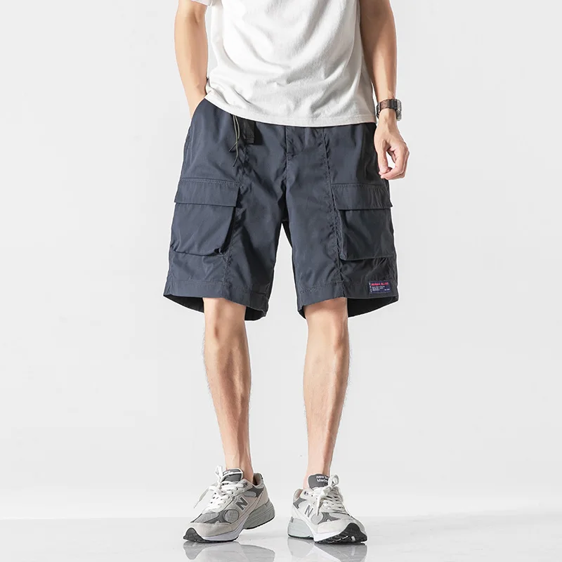 2025 verão novo casual workwear shorts de secagem rápida para homens com bolsos grandes cobertos, fivela elástica multifuncional w