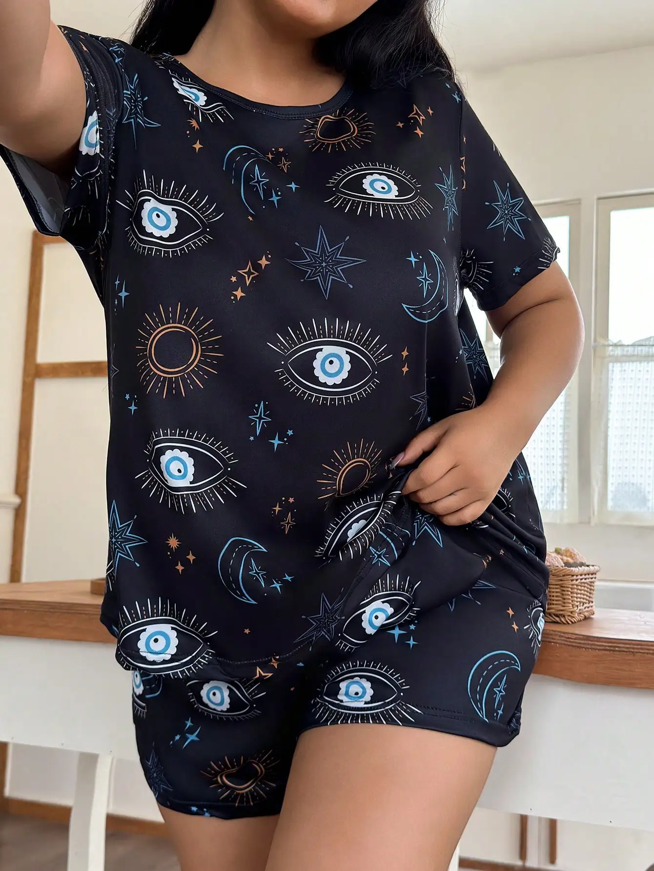 

Black Graphic Print Crew Neck Short Sleeve Pajama Set with Eyes and Stars Pattern